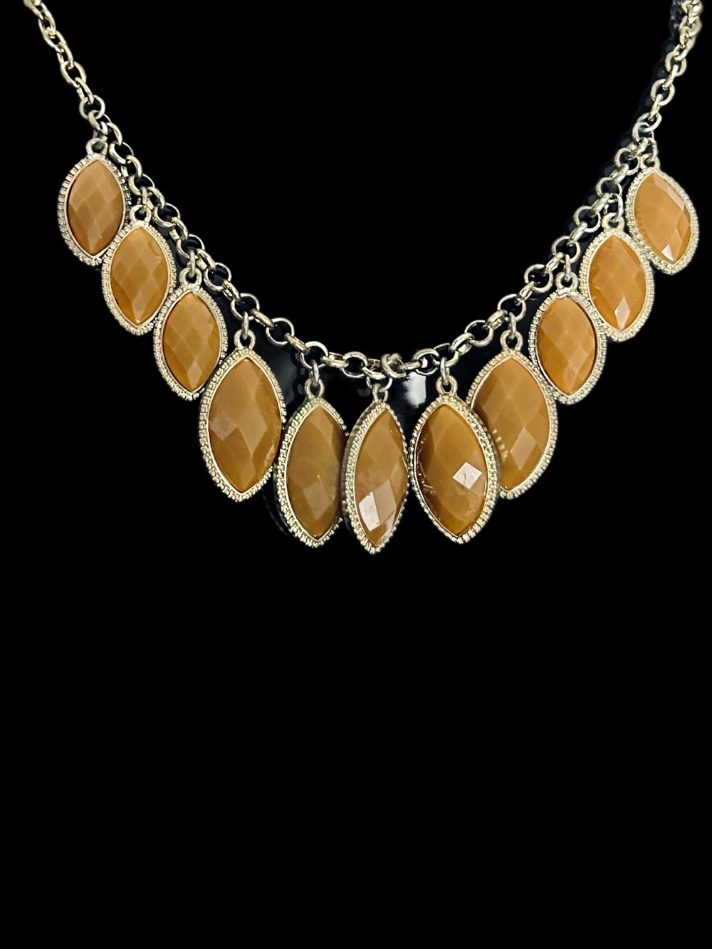 Gold-Tone Faceted Marquise Drop Necklace in Camel Brown.